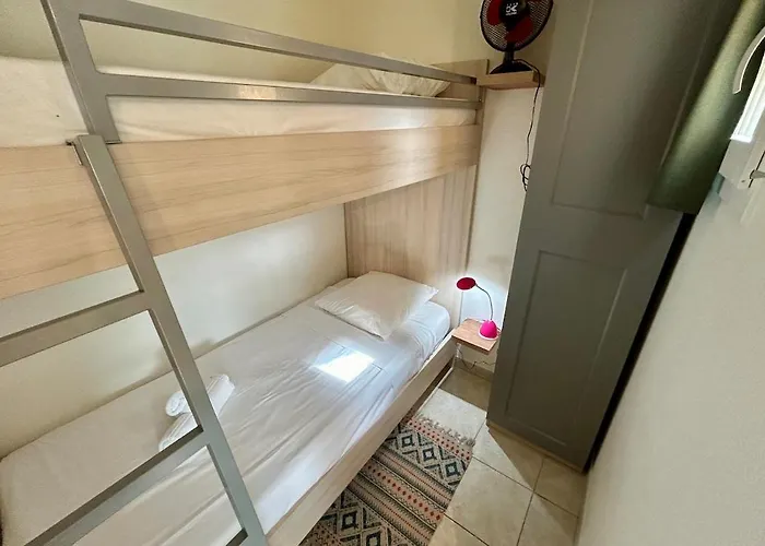 Bedroom In Pool Parking Apartmán Le Lavandou